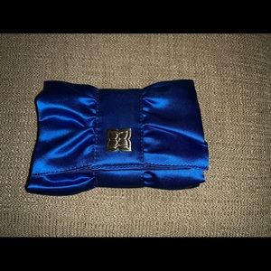 Like new royal blue BCBGMaxazria clutch.